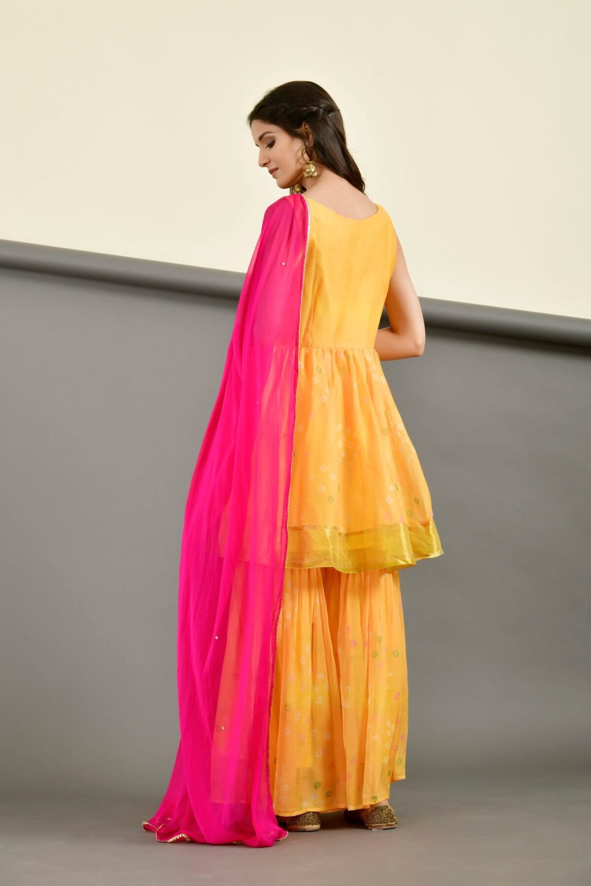 Yellow peplum gharara set