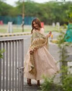 Creamy yellow tiered anarkali set