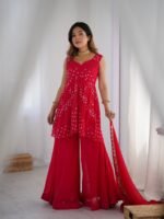 Crimson pink bpeplum kurta and flared palazzo set