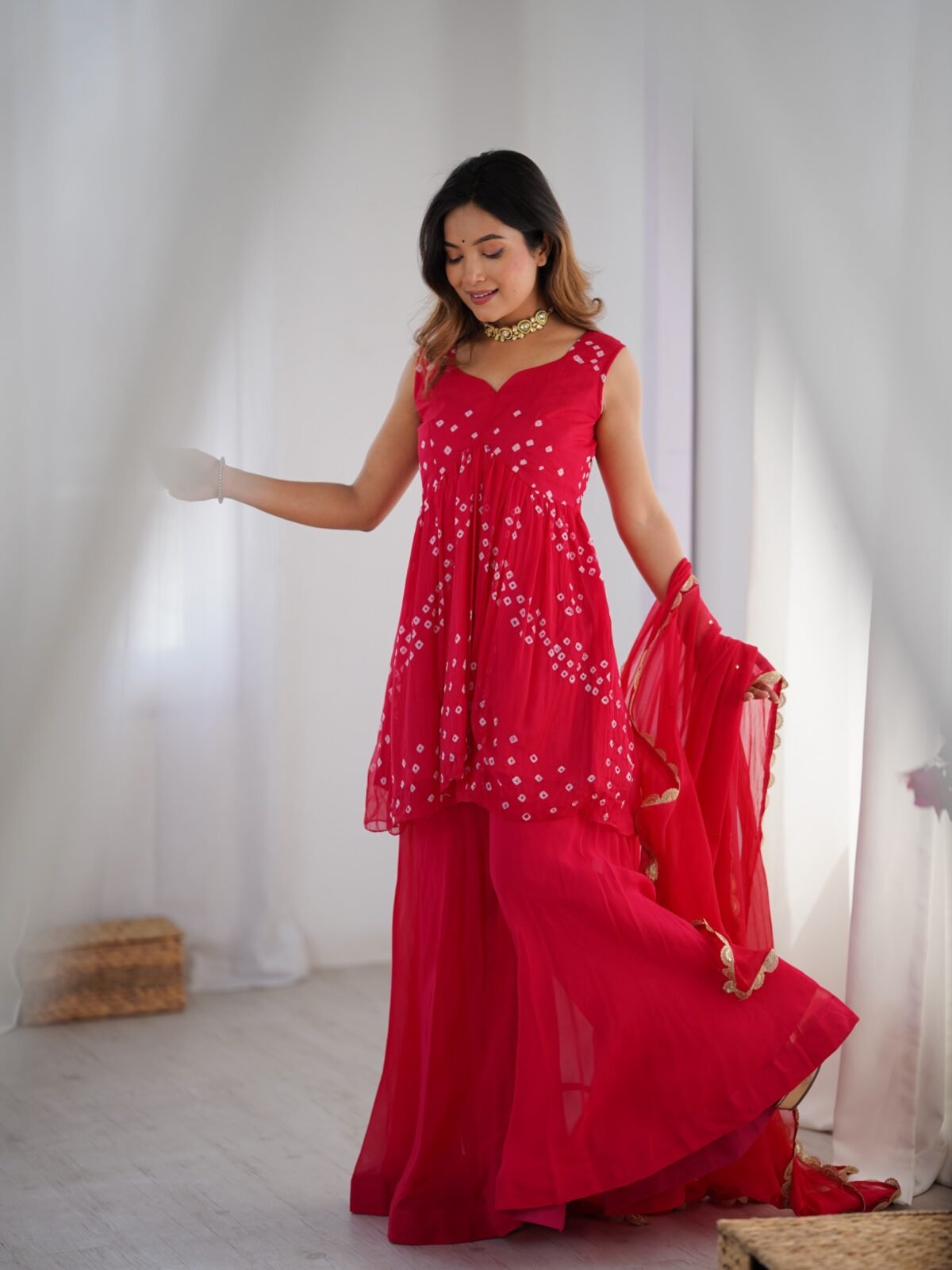 Crimson pink bpeplum kurta and flared palazzo set