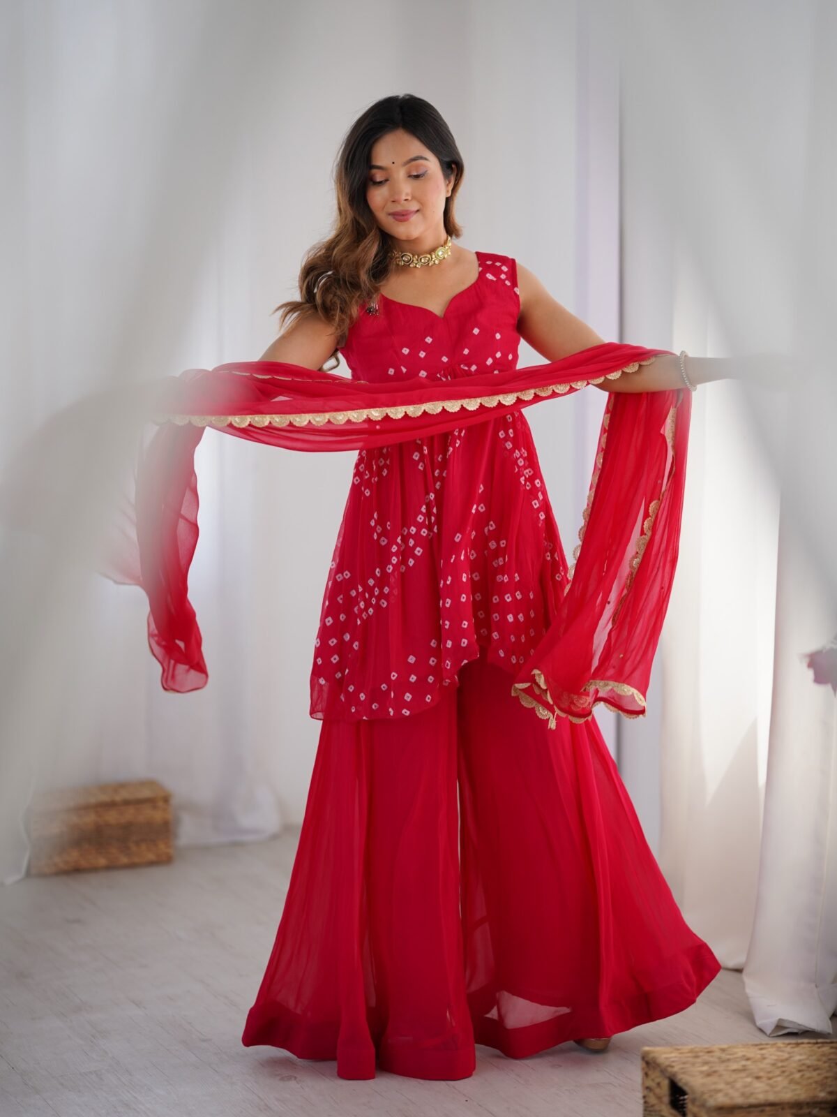 Crimson pink bpeplum kurta and flared palazzo set
