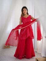 Crimson pink bpeplum kurta and flared palazzo set