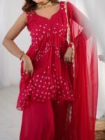 Crimson pink bpeplum kurta and flared palazzo set