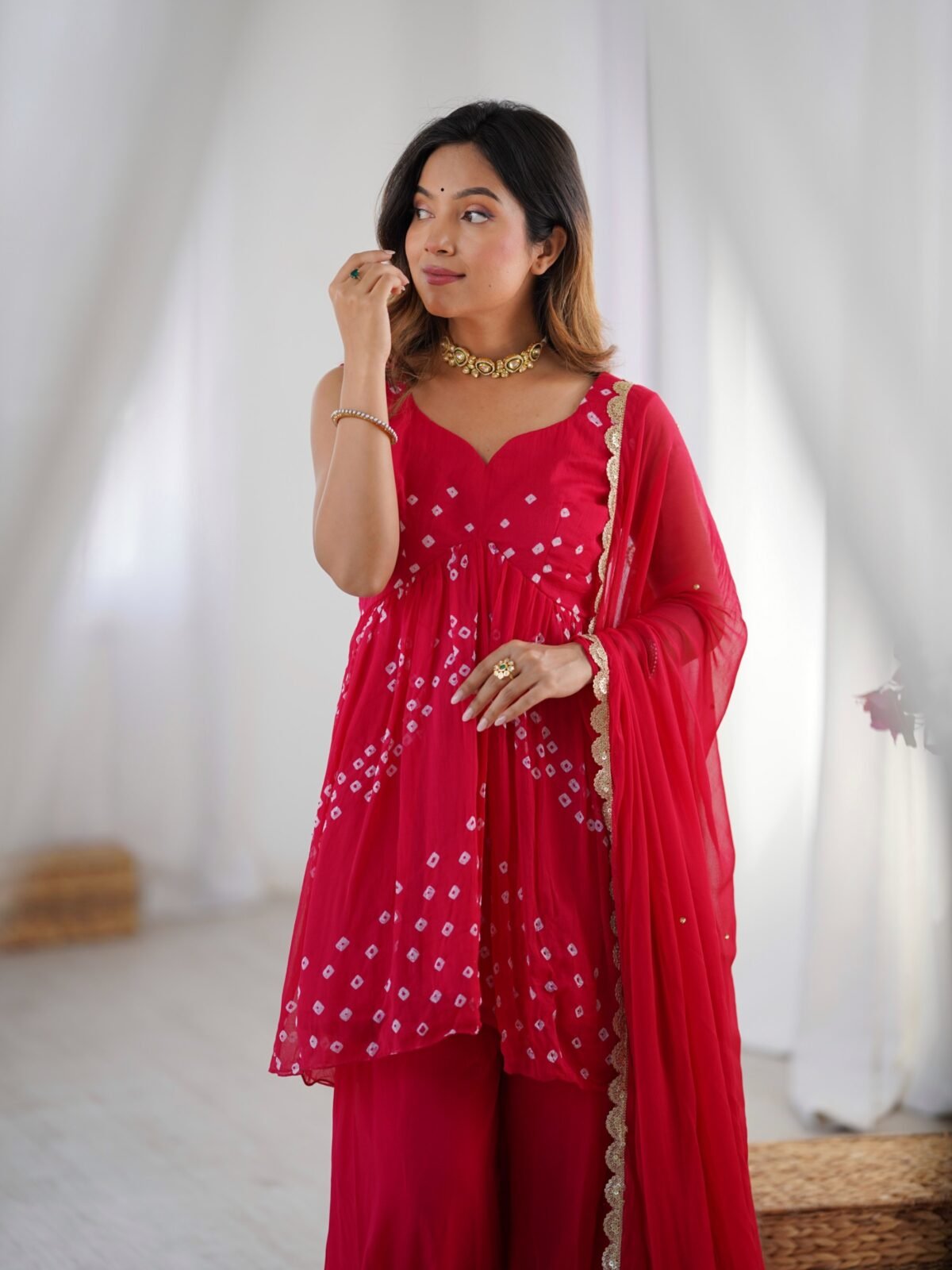Crimson pink bpeplum kurta and flared palazzo set