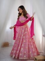Pink tiered lehenga with blouse and magenta dupatta