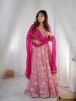 Pink tiered lehenga with blouse and magenta dupatta