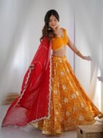 Yellow bandhani printed lehenga with blouse and red dupatta