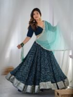 Teal blue lehenga with blouse and powder blue dupatta