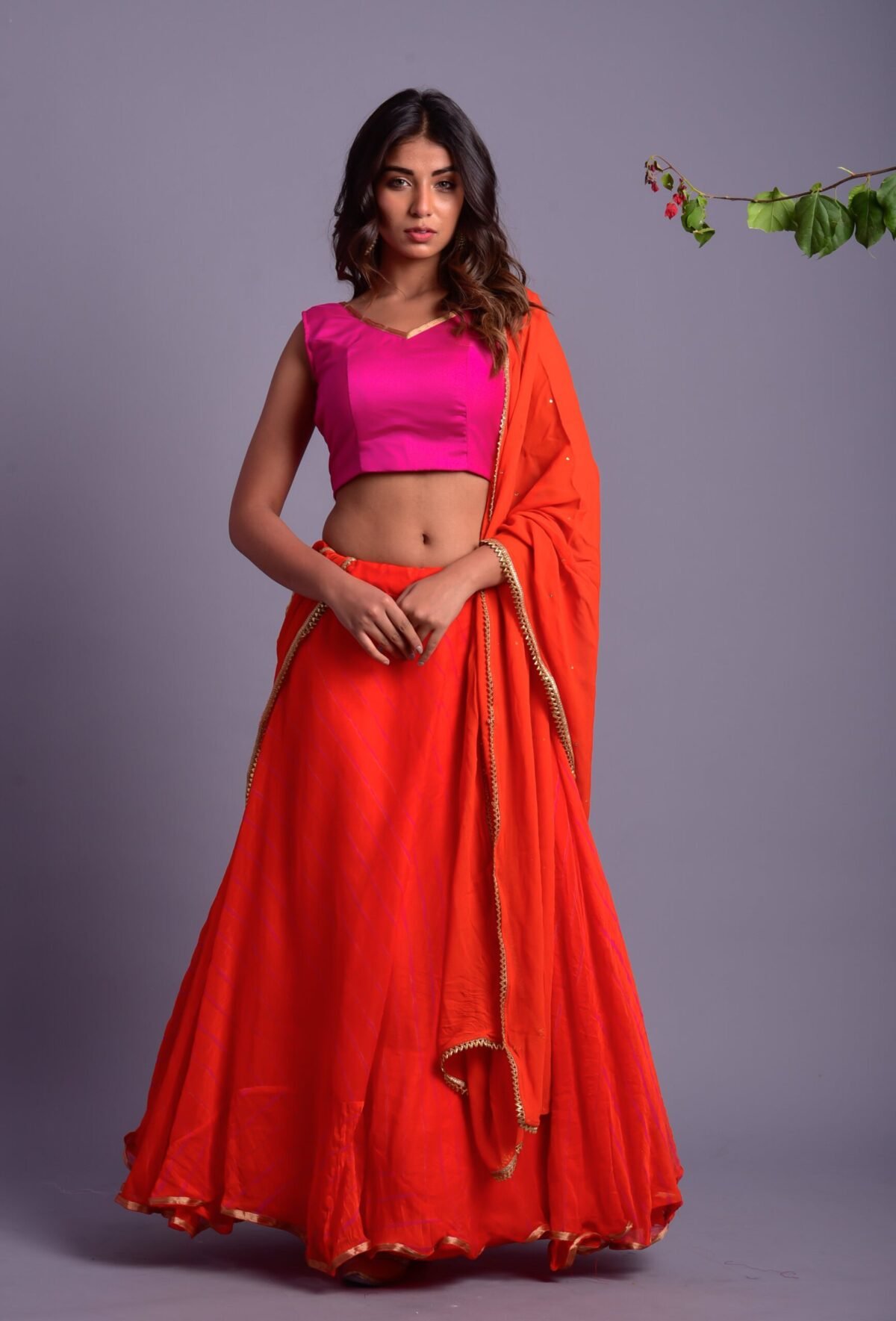 Orange Leheriya Lehenga Set with Magenta Blouse
