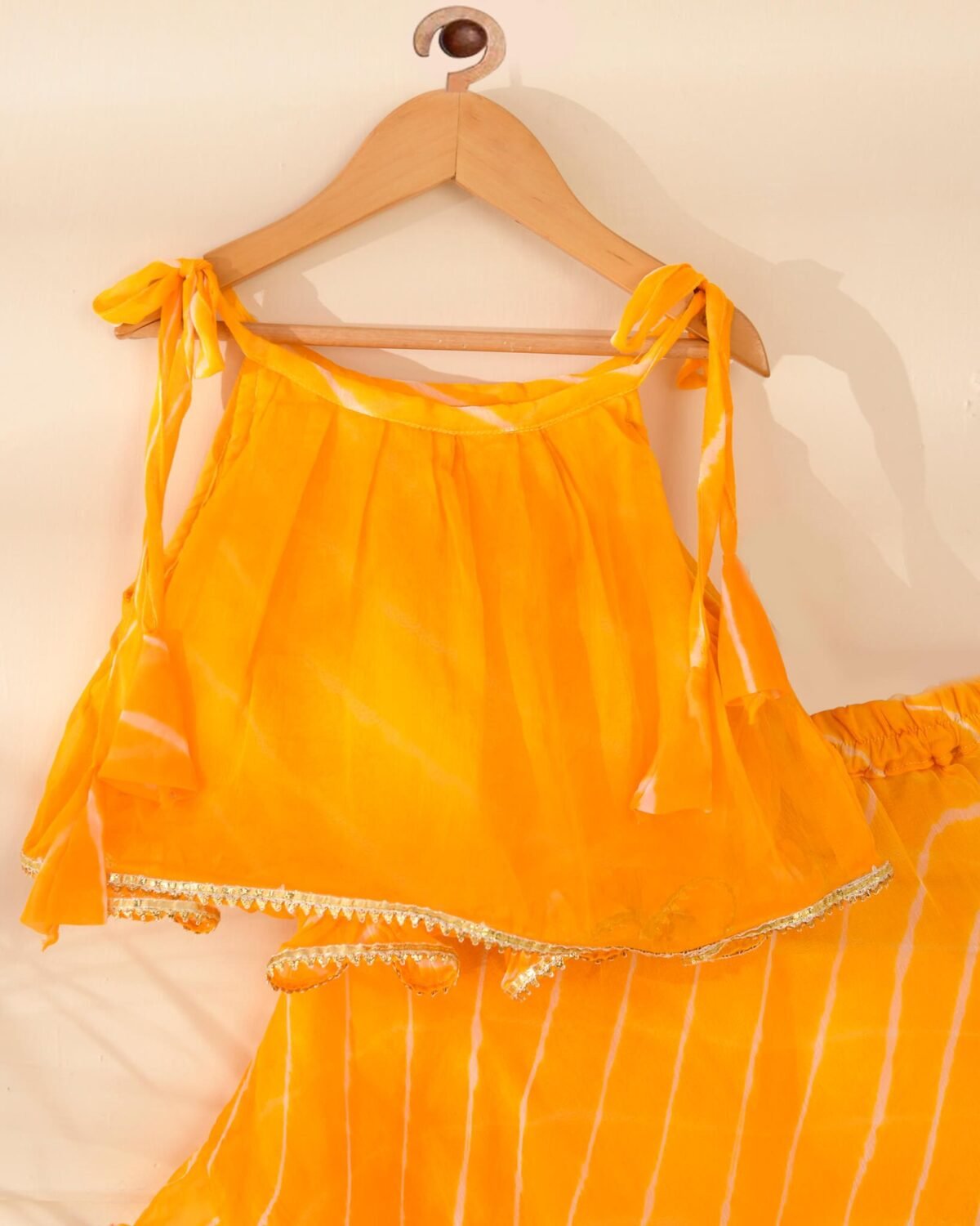 Kids yellow leheriya lehenga top set