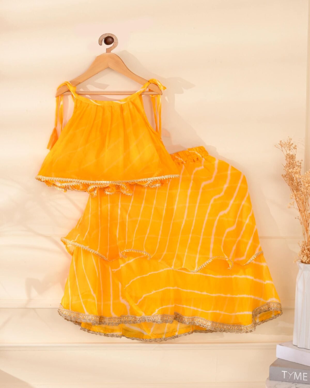 Kids yellow leheriya lehenga top set