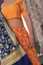 ORANGE BLOUSE WITH BLOUSE AND BLUE DUPATTA SET